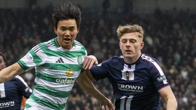 Celtic's Hyun Jun Yang and Dundee's Luke Graham