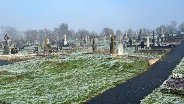 A frosty cemetery. 