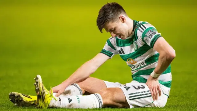 Celtic's Kieran Tierney sits injured at Pittodrie
