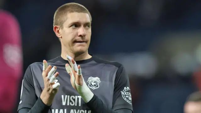 Ethan Horvath applauds travelling fans after making his Cardiff debut