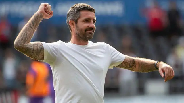 Alan Sheehan manager of Swansea City celebrates at full-time during the Championship match between Swansea City and Sheffield United.