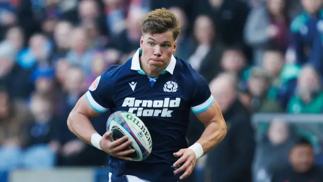 Huw Jones playing for Scotland