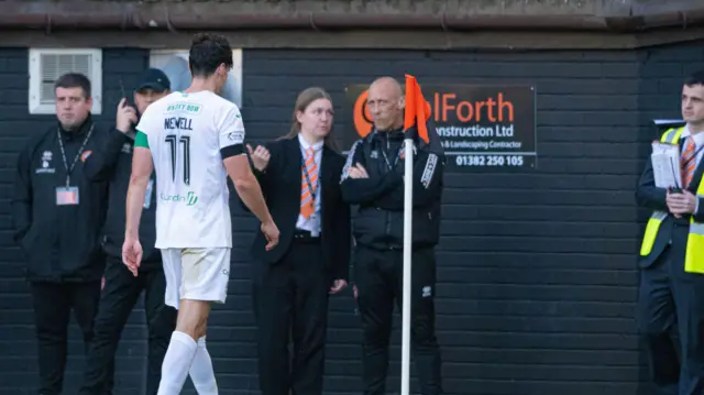 Joe Newell trudges off after his 85th-minute red card