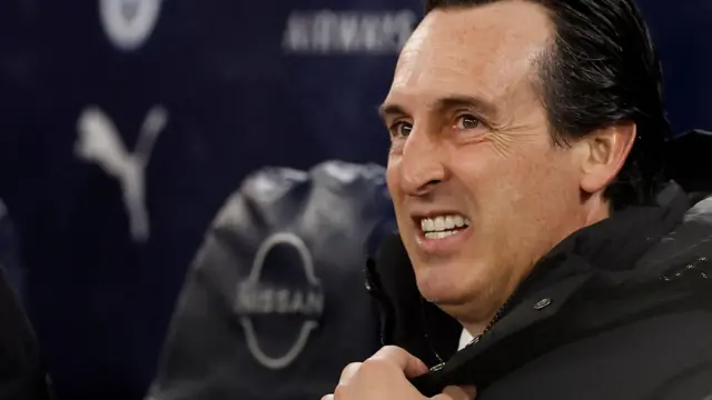 Unai Emery sits in the dugout