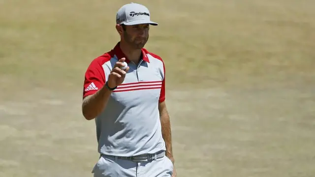 Dustin Johnson celebrates birdie