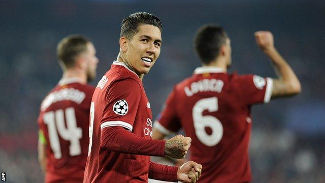 Liverpool forward Roberto Firmino celebrates scoring against Sevilla