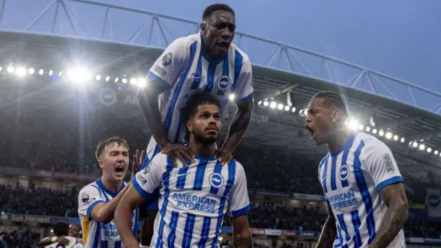 Georginio Rutter celebrates with team-mates Danny Welbeck, Igor Julio and Jack Hinshelwood after equalising for Brighton against Tottenham