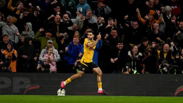 Rayan Ait-Nouri of Wolverhampton Wanderers celebrating after scoring the equalising goal during the Premier League match between Wolverhampton Wanderers FC and Liverpool FC at Molineux