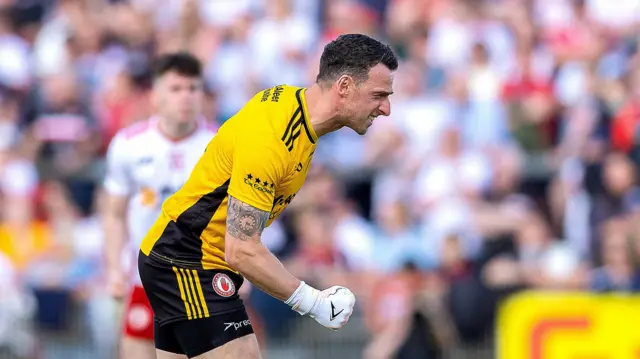 Tyrone keeper Niall Morgan celebrates his late winner against Mayo