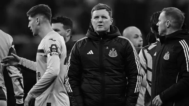 A black and white photo of Eddie Howe