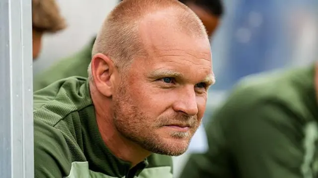 Liam Manning in the dugout