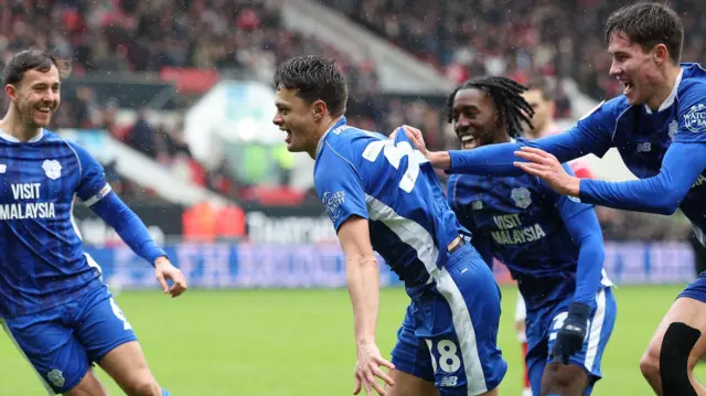 Perry Ng celebrates scoring for Cardiff