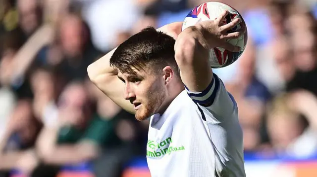 George Thomason playing for Bolton