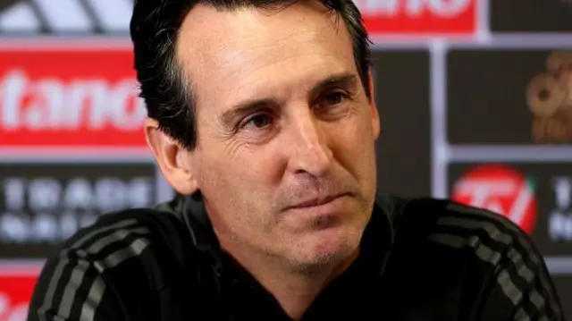 Unai Emery looks on during a news conference