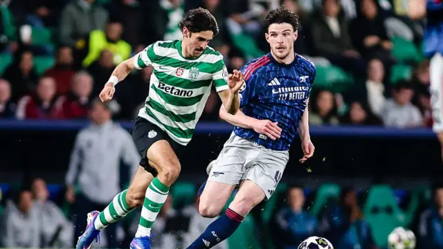Francisco Trincao and Declan Rice contest for the ball