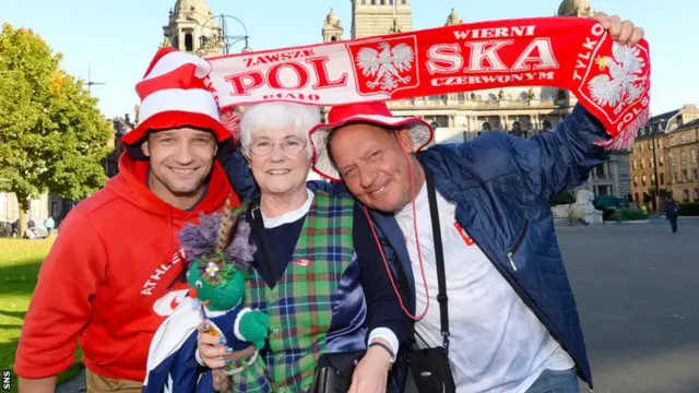 Scotland and Poland fans mix in Glasgow's George Square