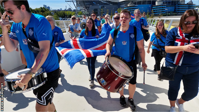 Hundreds of Iceland fans marched from Manchester city centre to the Academy Stadium