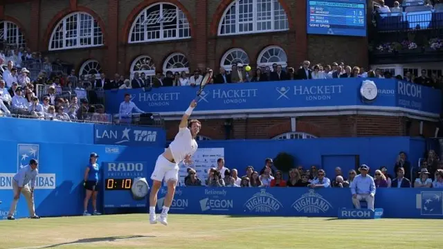 Murray serves