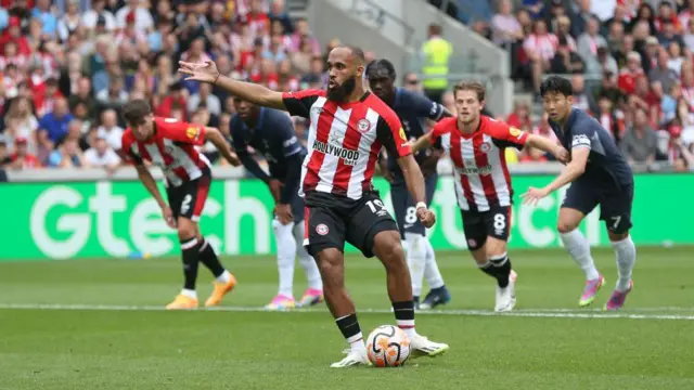 Bryan Mbeumo takes a penalty against Tottenham