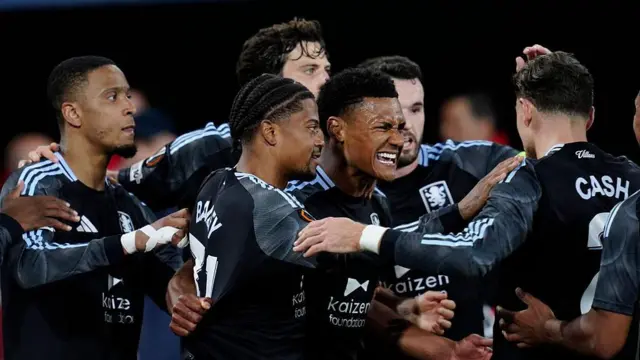 Ollie Watkins celebrates with his team-mates