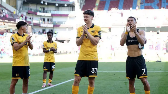 Wolves players applaud fans after Burnley draw