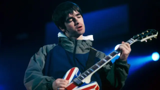 Noel Gallagher performing live at Maine Road in 1996