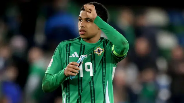 Shea Charles applauding Northern Ireland fans