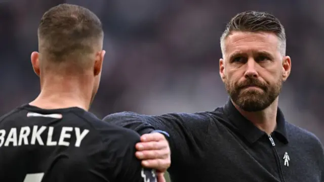 Rob Edwards consoles Ross Barkley after Luton's late defeat at Tottenham