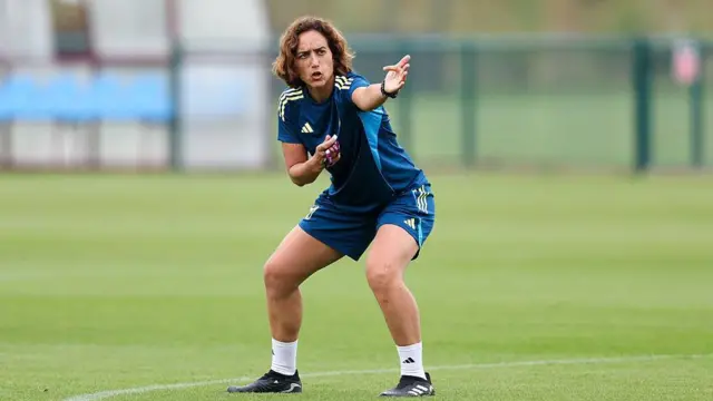 Natalia Arroyo directs a drill in Villa training