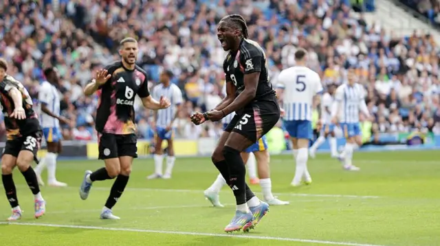 Caleb Okoli of Leicester City celebrates after scoring
