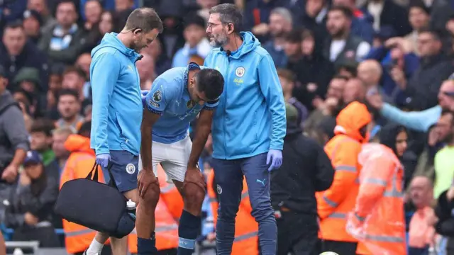 Rodri with medical staff