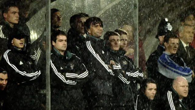 Ruud Gullit looks on from dugout with arms folded looking dejected as Newcastle play Sunderland in 1999