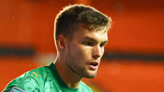 Goalkeeper Ben Winterbottom in action for Barrow.