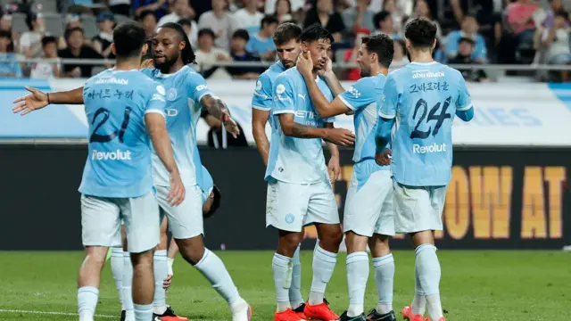 Manchester City's Tijjani Reijnders celebrates scoring their second goal with teammates