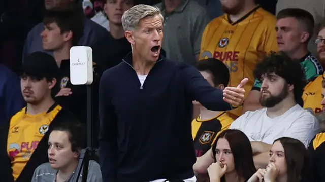 Newport manager Dave Hughes shouts from the touchline