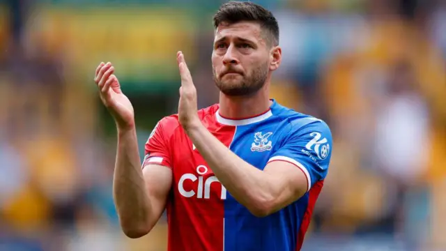 Joel Ward of Crystal Palace applauds the supporters following the Premier League match between Wolverhampton Wanderers and Crystal Palace at Molineux on May 11, 2024