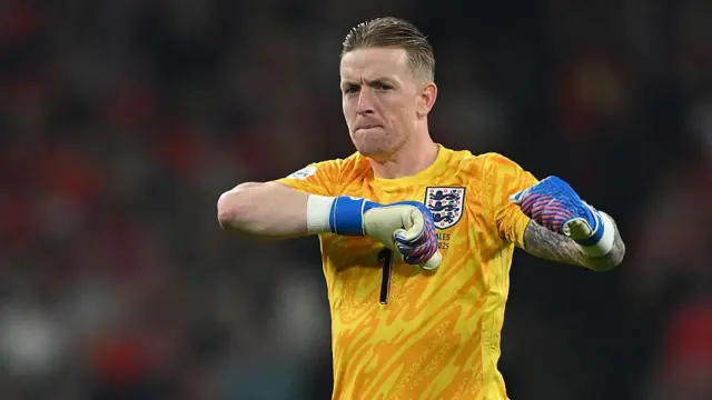 Jordan Pickford celebrates for England