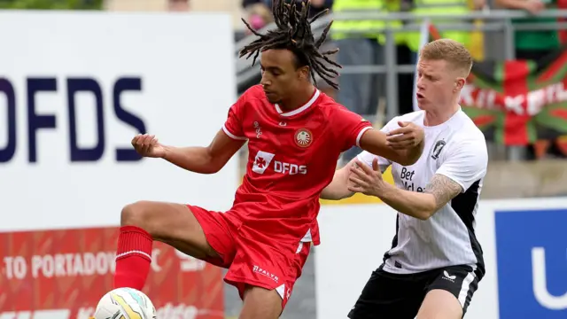 Josh Ukek in action against Glentoran