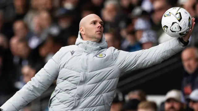 Craig McLeish does his best impression of a goalkeeper