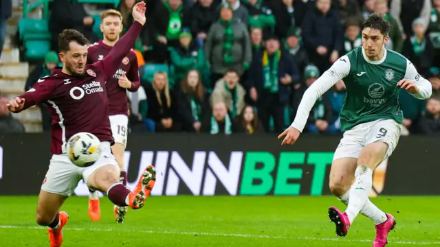 Kieron Bowie scores for Hibernian against Hearts