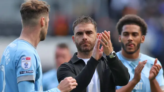 Omer Riza and players after defeat to Hull