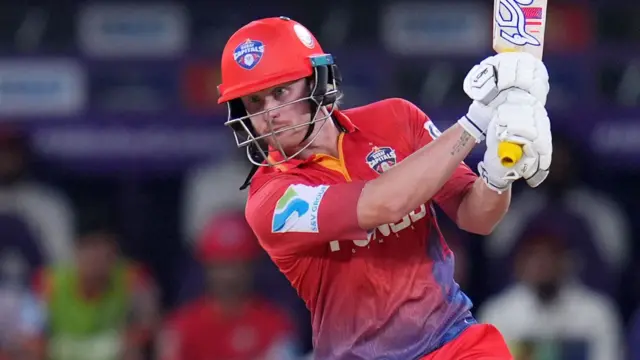 Jordan Cox plays a shot while playing for Dubai Capitals