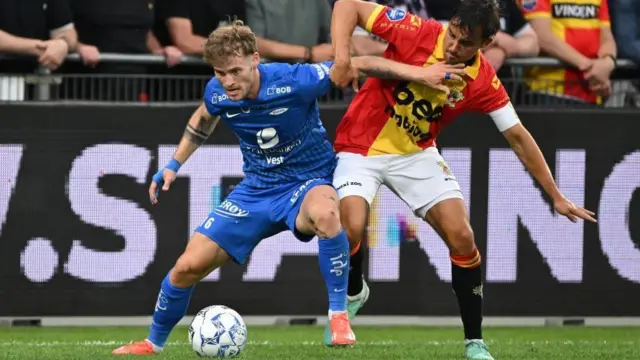 Brann's Ole Didrik Blomberg (left) against Go Ahead Eagles