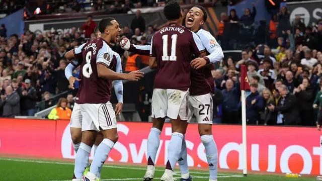 Morgan Rogers of Aston Villa celebrates with Ollie Watkins of Aston Villa.
