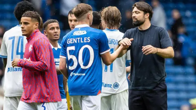 Rangers head coach Russell Marton (R) and Joshua Gentles at full time during a pre-season friendly match between Rangers and Club Brugge at Ibrox Stadium