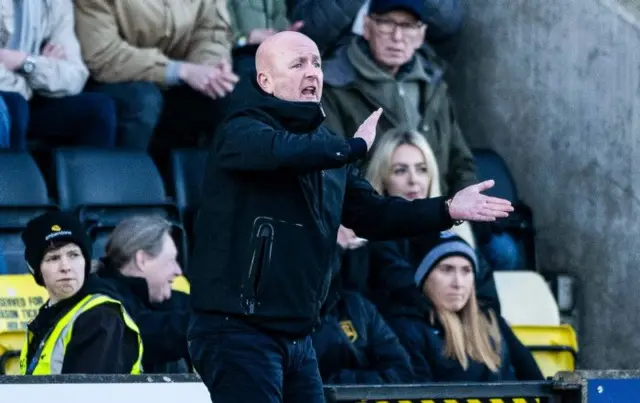 David Martindale shouts instructions to his players this afternoon from the dugout