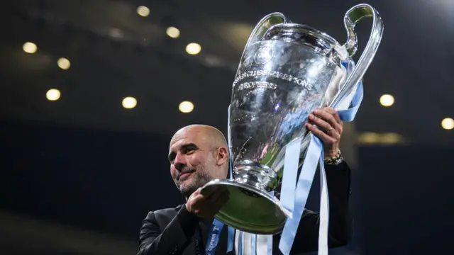 Pep Guardiola with the Champions League trophy