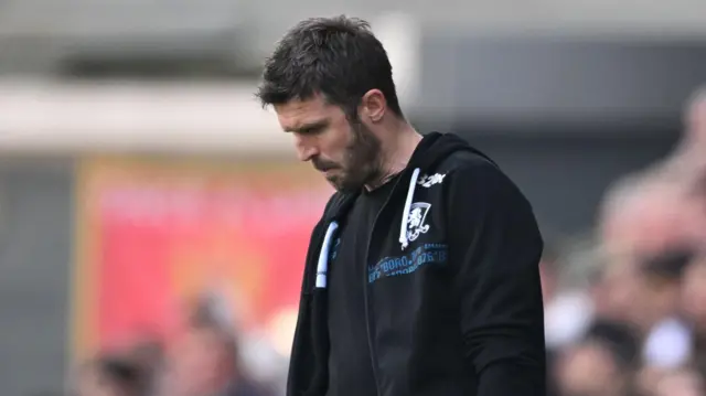 Michael Carrick looks down