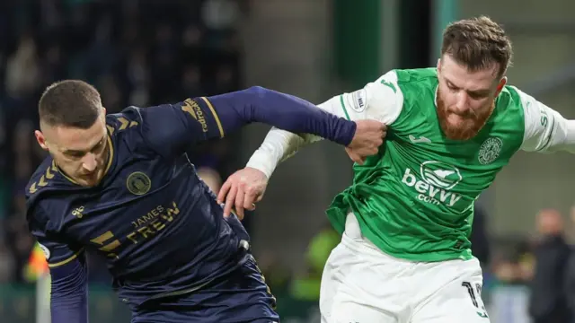 Hibernian's Nicky Cadden and Kilmarnock's Kyle Magennis