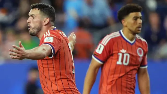 Scotland players John McGinn and Che Adams